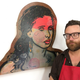 Artist Andy Herod with one of the portraits inspired by a People You May Know suggestion he received on Facebook